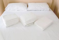 کاور تخت دو نفره یک بار مصرف + روبالشی